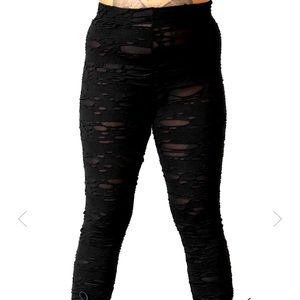 Killstar deserter leggings. Tear like style with tights underneath. See through